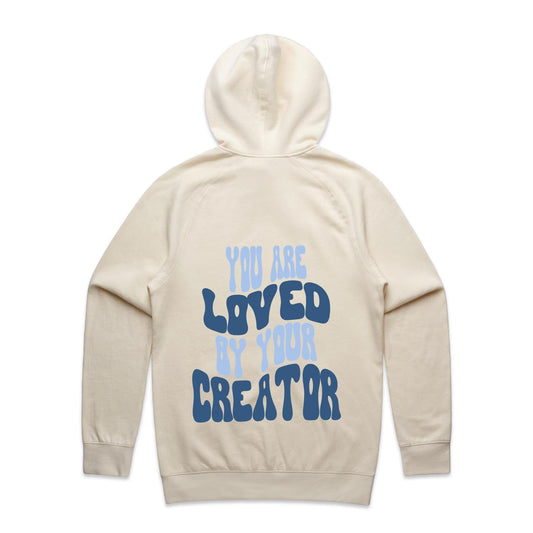 Christian hoodie with bold, wavy text on the back reading “You are LOVED by your CREATOR” in layered light and dark blue lettering. A comforting, gospel-centered design by Lighthouse Christian Clothing, reminding wearers of their unshakable identity and worth in the eyes of their Creator.