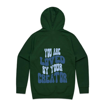 Christian hoodie with bold, wavy text on the back reading “You are LOVED by your CREATOR” in layered light and dark blue lettering. A comforting, gospel-centered design by Lighthouse Christian Clothing, reminding wearers of their unshakable identity and worth in the eyes of their Creator.
