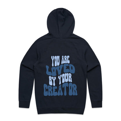 Christian hoodie with bold, wavy text on the back reading “You are LOVED by your CREATOR” in layered light and dark blue lettering. A comforting, gospel-centered design by Lighthouse Christian Clothing, reminding wearers of their unshakable identity and worth in the eyes of their Creator.