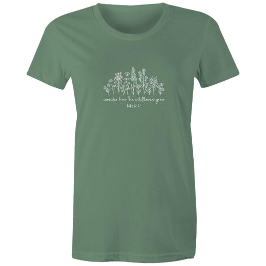 Christian t-shirt featuring white wildflower design with the Bible verse 'Consider how the wildflowers grow – Luke 12:27' — faith-inspired apparel by Lighthouse Christian Clothing.